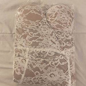 Lace / nude gown with removable sleeves.